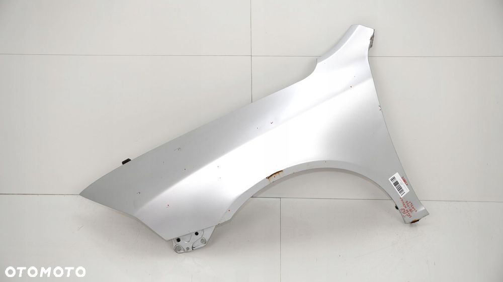 BŁOTNIK LEWY PRZÓD SKODA OCTAVIA II LIFT 08-13R LA7W - 11