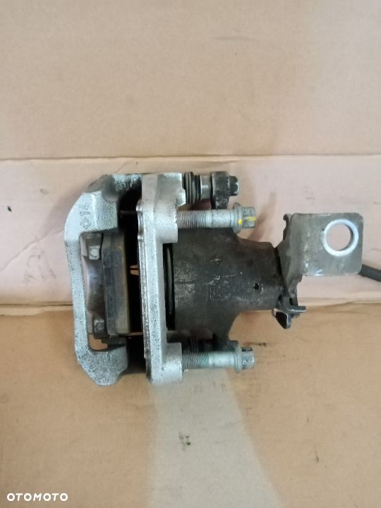 Zacisk hamulcowy prawy tyl Hyundai i30 KIA 2018R III 1.4 - 2