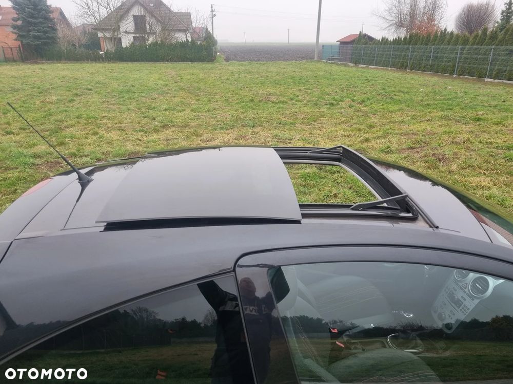 Opel Corsa 1.4 16V Cosmo - 17