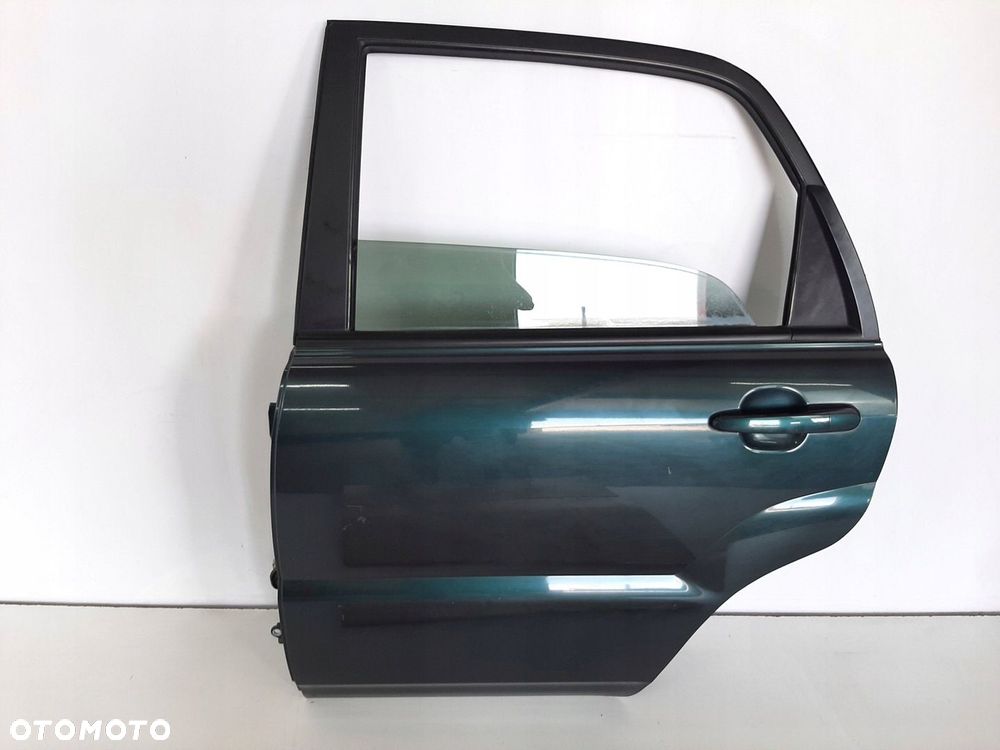 KIA SPORTAGE 2 II LIFT 09R DRZWI LEWY TYL KOD E2