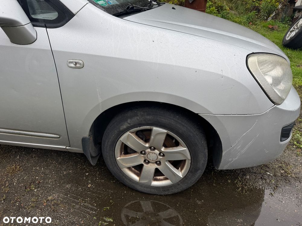 KIA CARENS III 06-12 MASKA ZDERZAK PAS BELKA BŁOTNIK WZMOCNIENIE LAMPA PRZÓD KOLOR 7S - 4