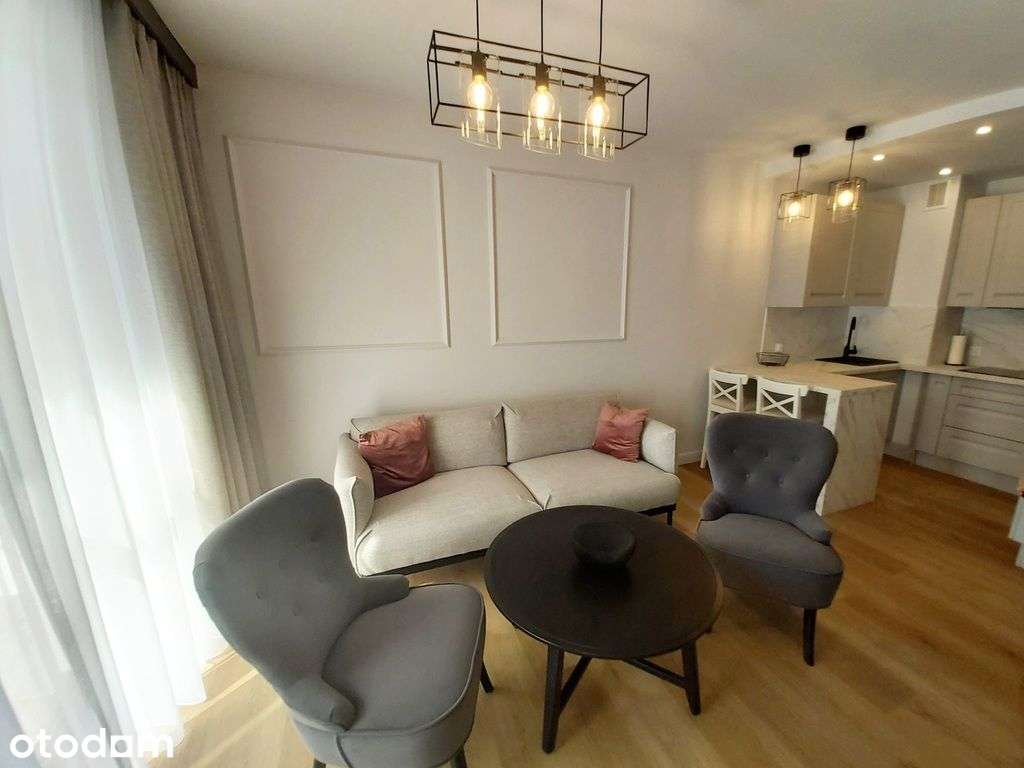 Komfortowy apartament z balkonem i garażem