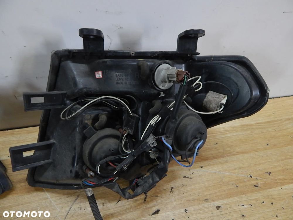 Lampa reflektor przód komplet Nissan Navara D40 Pathfinder R51 05-12 Shadow Line Łuków części - 6