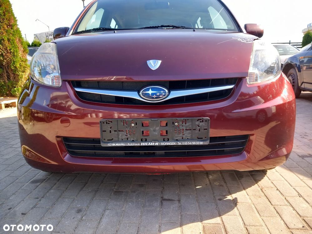 SUBARU JUSTY ZDERZAK PRZEDNI PRZÓD KOLOR: R56