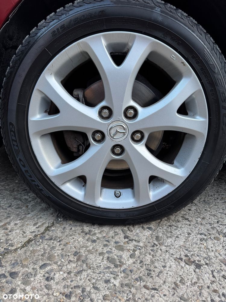 Mazda 3 2.0 Exclusive + - 14
