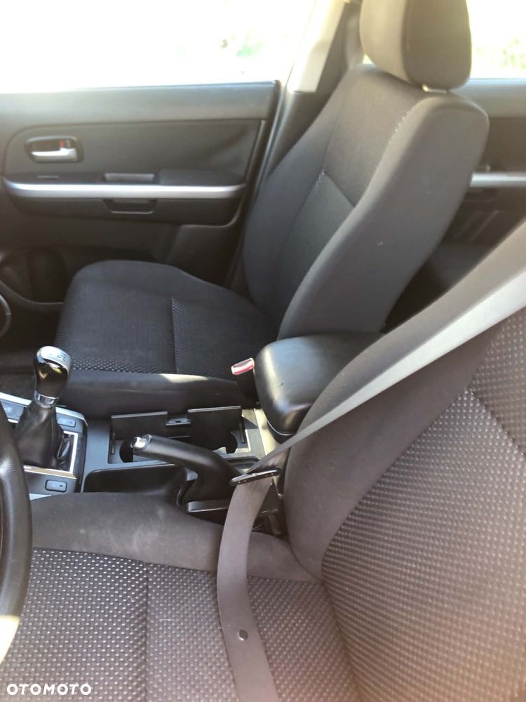 Suzuki Grand Vitara 2.0 - 7