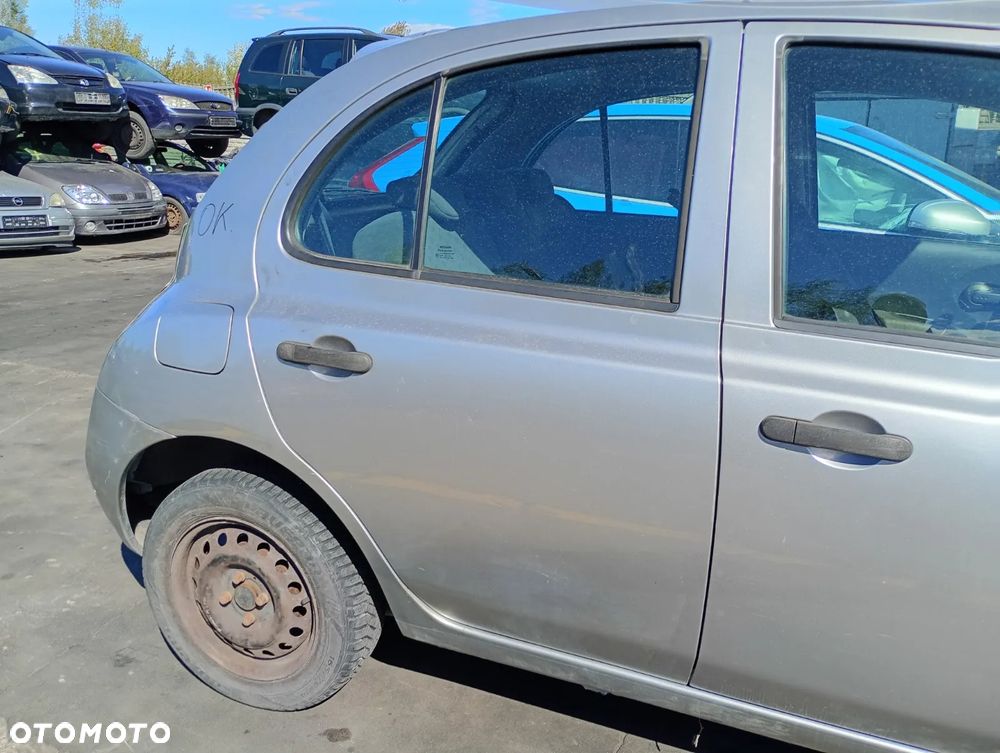 NISSAN MICRA K12 03-07 1.2 16V CG12DE - LAMPKA OŚWIETLENIA TABLICY REJESTRACYJNEJ - 3