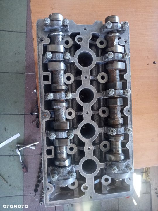 głowica astra zafira b 1.6 16v z16xe1 55559597 - 2