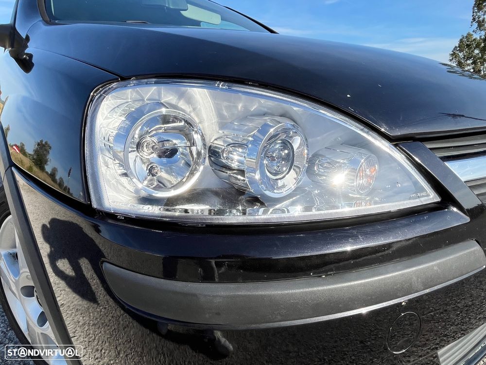 Opel Corsa 1.2 16V Cosmo - 6