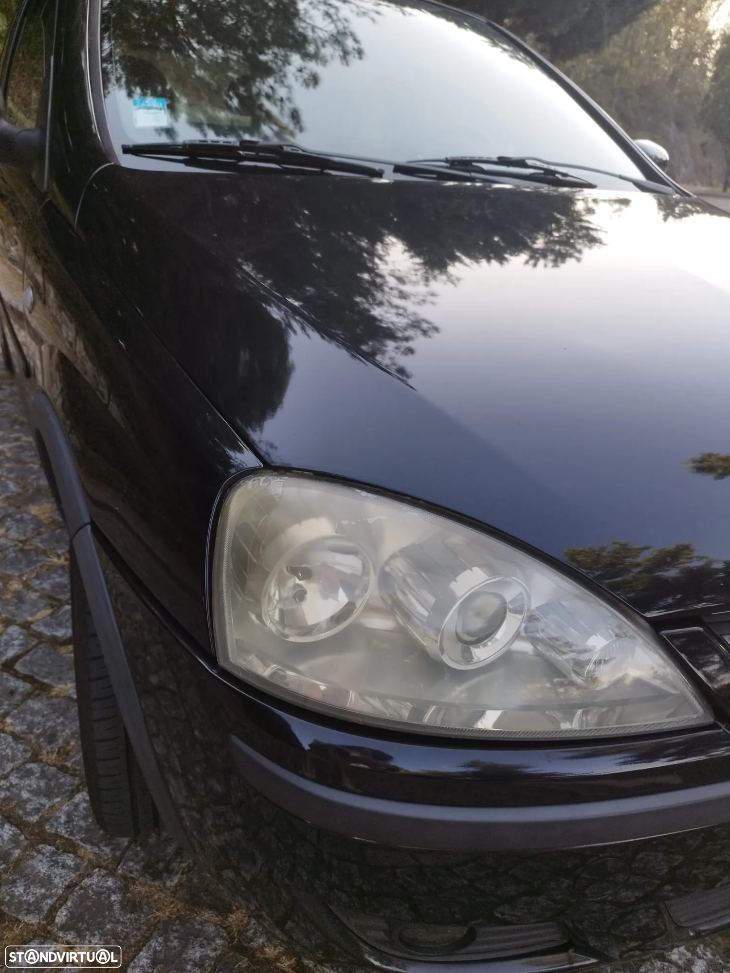 Opel Corsa 1.2 16V Enjoy - 11
