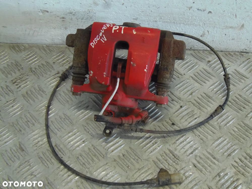 DISCOVERY IV 12R 3.0 D ZACISK PRAWY TYŁ - 1