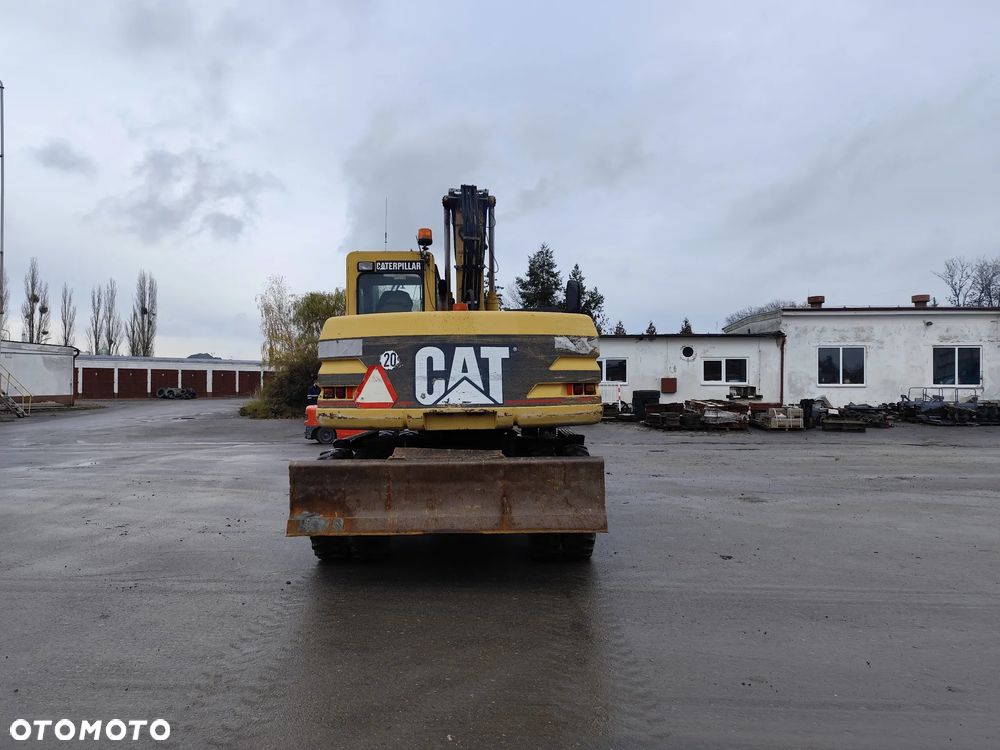 Caterpillar M 312 - 5