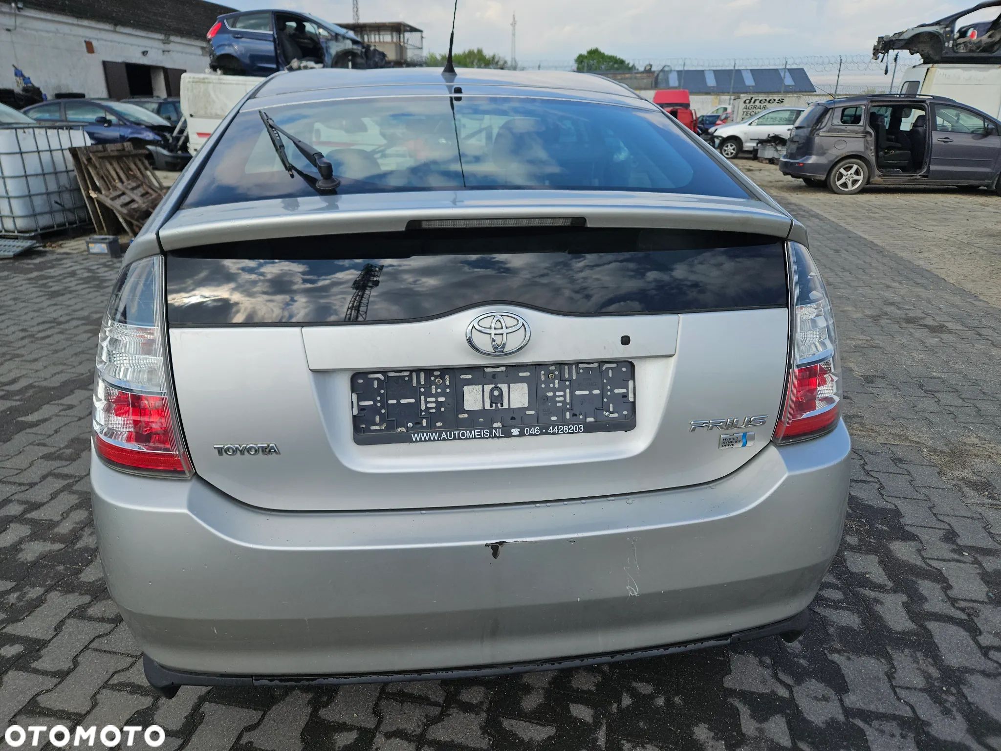 Klapa bagażnika zderzak tylny tył Toyota Prius II 2005r lak. 1C0 - 1