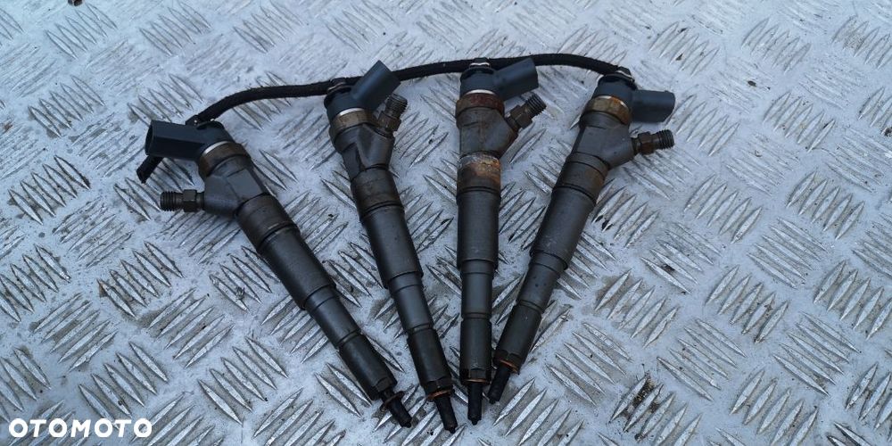 BMW E46 E53 E60 E83 E90 WTRYSKIWACZ PALIWA 0445110131 7789661