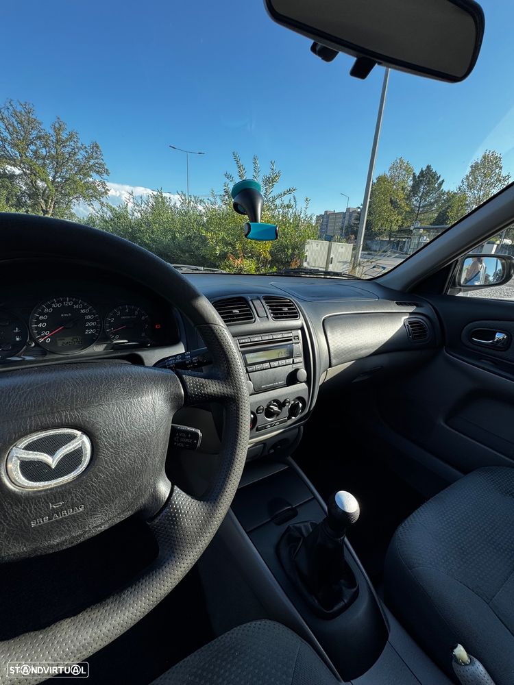 Mazda 323 F 1.3 Comfort AC+CR - 9