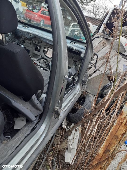 SŁUPEK SZYBOWY PRAWY LUB LEWY VW PASSAT B6 KOMBI - 2