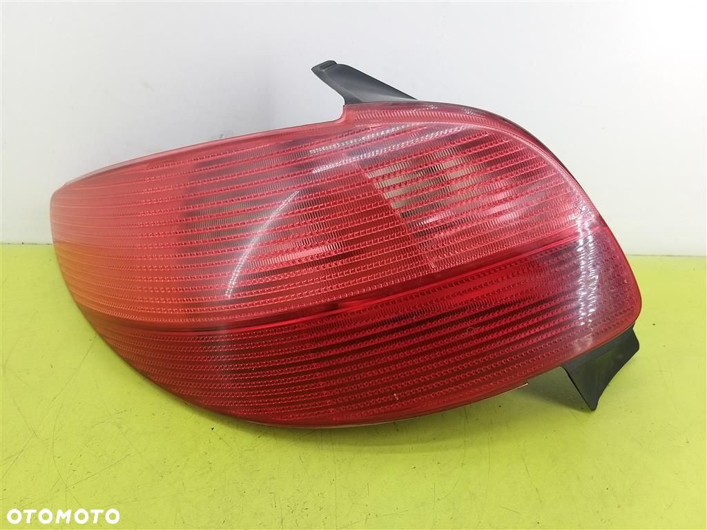 Lampa lewa tylna tył Peugeot 206 1998-2003 PRZED LIFT AXO SCINTEX HATCHBACK - 1