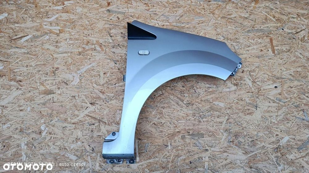 BŁOTNIK PRAWY PASAŻERA SREBRNY RENAULT TWINGO II 2 2012 1.2B LIFT