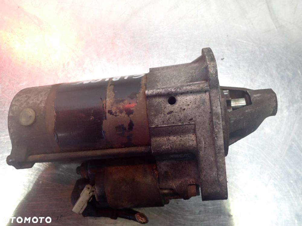 ROZRUSZNIK DAIHATSU SIRION II 28100-97214 428000-0860 - 3