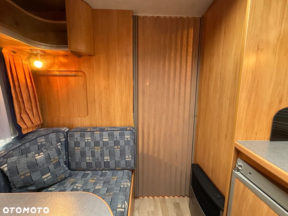 Adria ADORA 542 TK z przedsionkiem Isabella i łóżkami piętrowymi. - 23