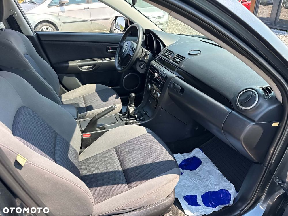 Mazda 3 1.6 Exclusive + - 16