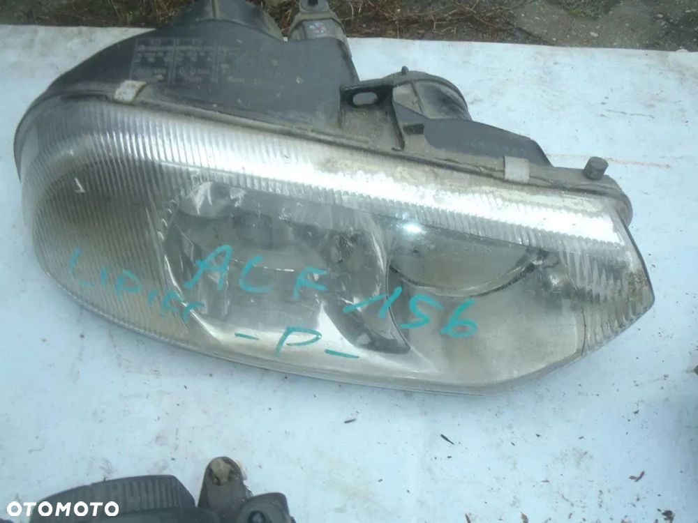 lampa reflektor alfa romeo 156 europa oryginal duzo do nich - 1