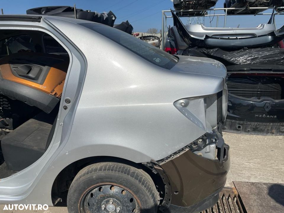 Aripa stanga spate Dacia Logan 2013-2020