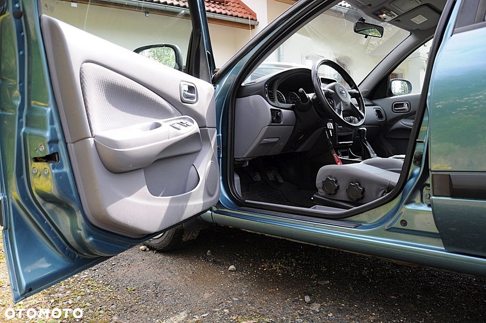 Nissan Almera 1.5 Visia + - 7