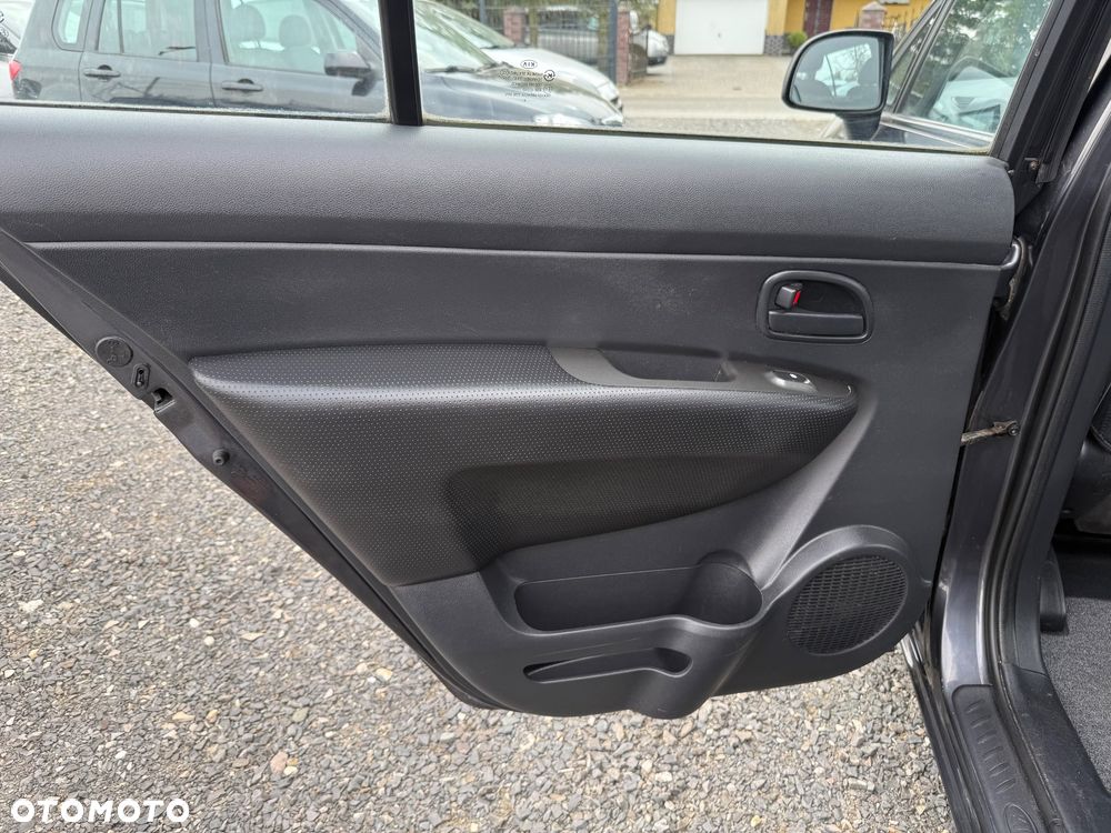 Kia Carens 2.0 CVVT EX - 21