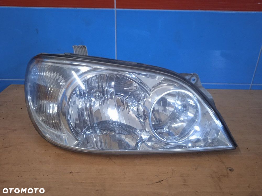 Lampa Prawa Przednia Kia Carnival I Lift - 1