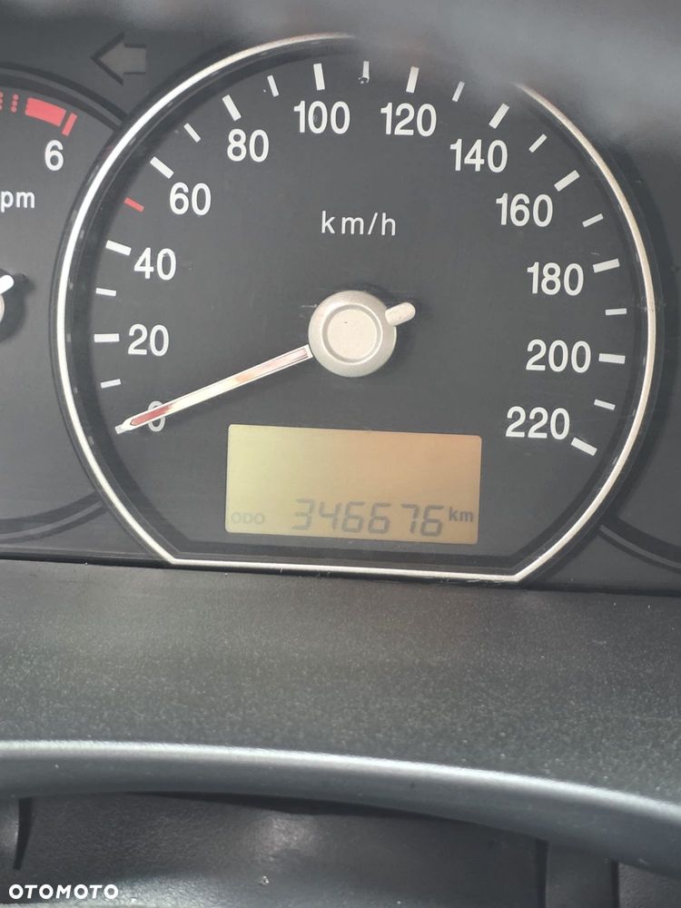 Kia Carens - 5