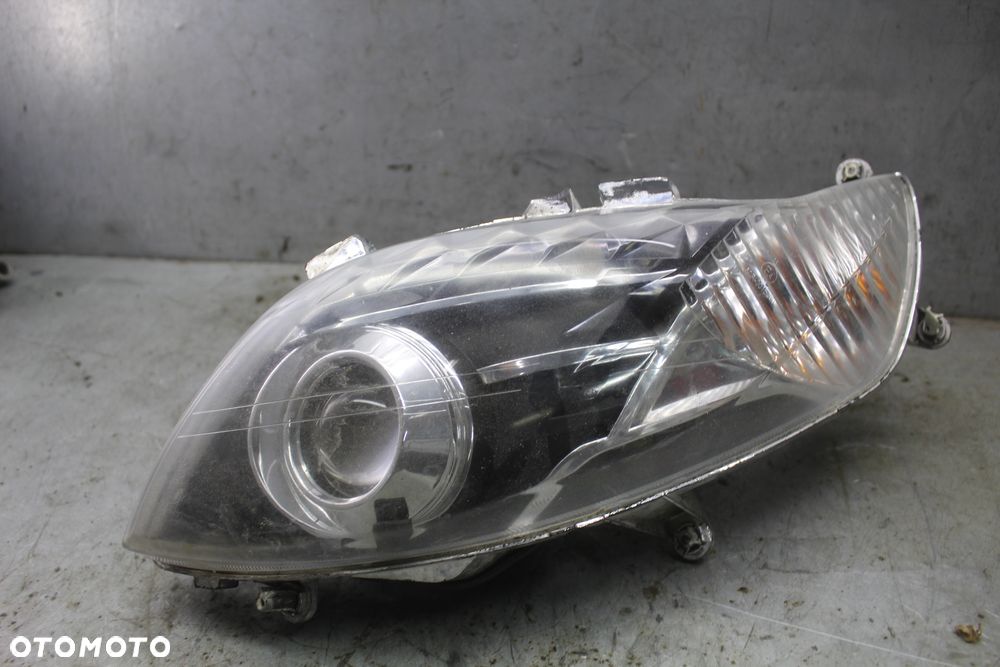 Sym Maxsym 600 400 Quad Rider Lampa przód przednia reflektor - 1