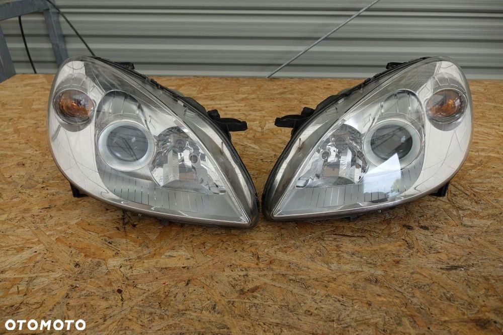 REFLEKTOR 2 LAMPY PRZÓD LEWA PRAWA EUROPA MERCEDES W245 3242342 - 1