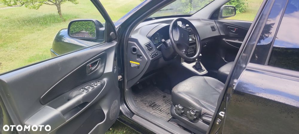 Hyundai Tucson 2.0 CRDi VGT 4WD GLS - 11