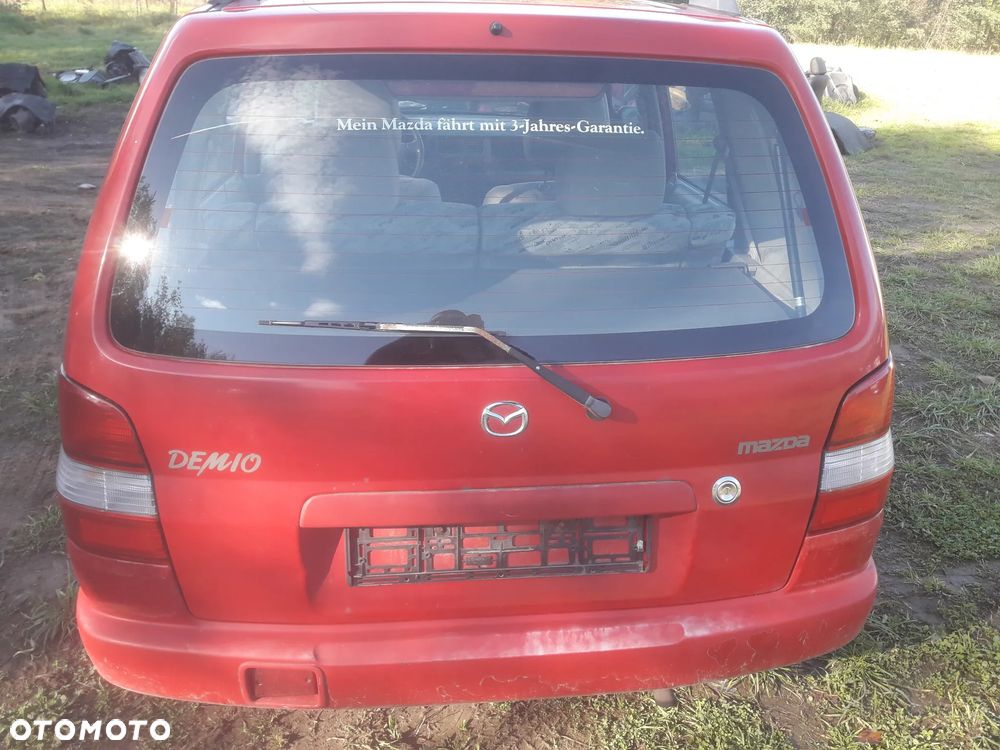 Mazda Demio 97-Klapa Zderzak tylny szybapas  lampa belka Kolor SU - 1