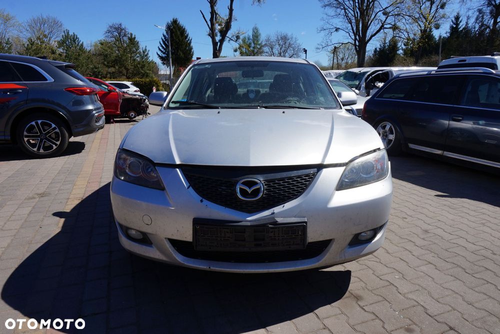 MASKA ZDERZAK BŁOTNIKI LAMPY 3 I BK 22V  MAZDA 2003-2006 SREBRNY PRZÓD KOMPLETNY - 1