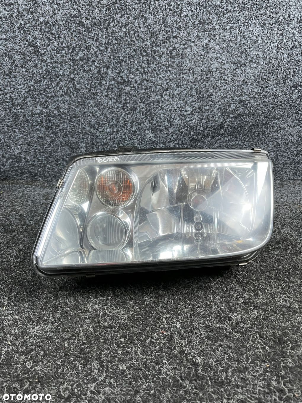 vw bora reflektor lampa lewy przód lewa przednia hella OE - 2