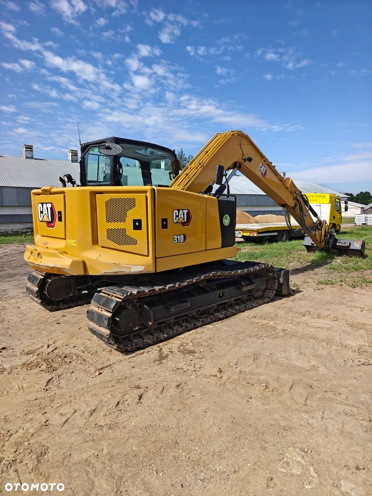 Caterpillar 310 - 5