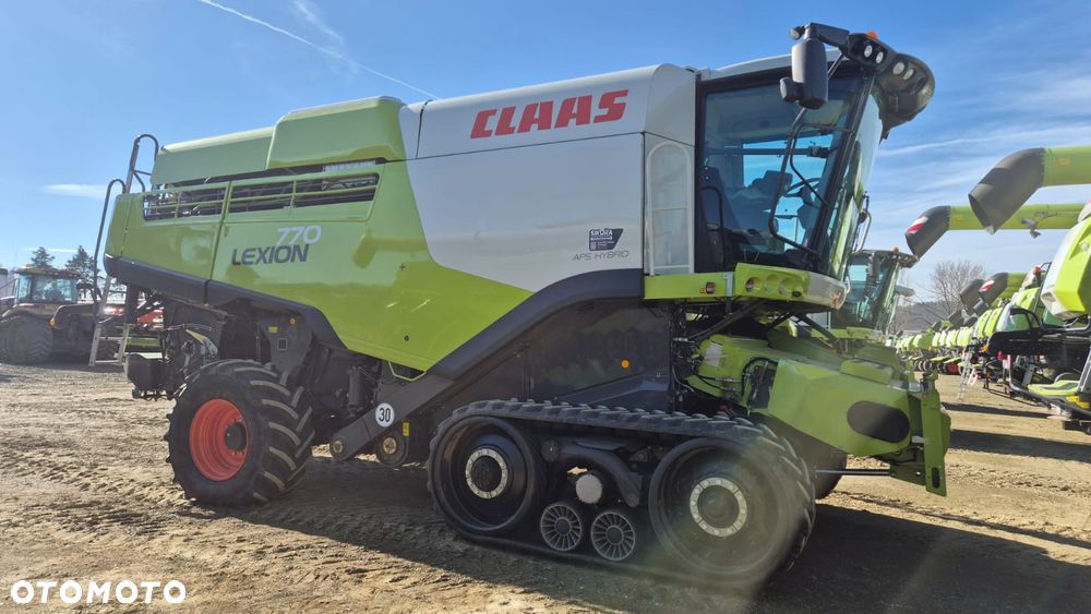Claas Lexion 770TT z hederem - 2