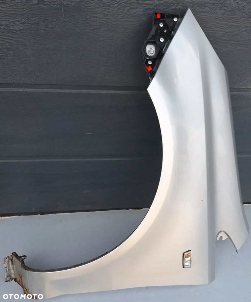 BŁOTNIK PRZEDNI LEWY - OPEL CORSA D /  SREBRNY-Z157 - 1
