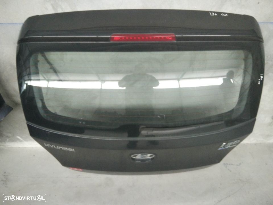 TAMPA DA MALA HYUNDAI I30 07-11 - 1