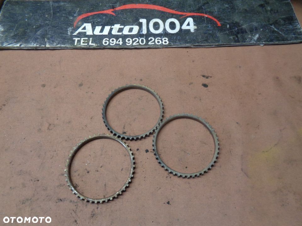 WYPRZEDAZ FORD MAVERICK ESCAPE MAZDA TRIBUTE KORONKA  PIERSCIEN ABS ROZNE CZESCI - 1