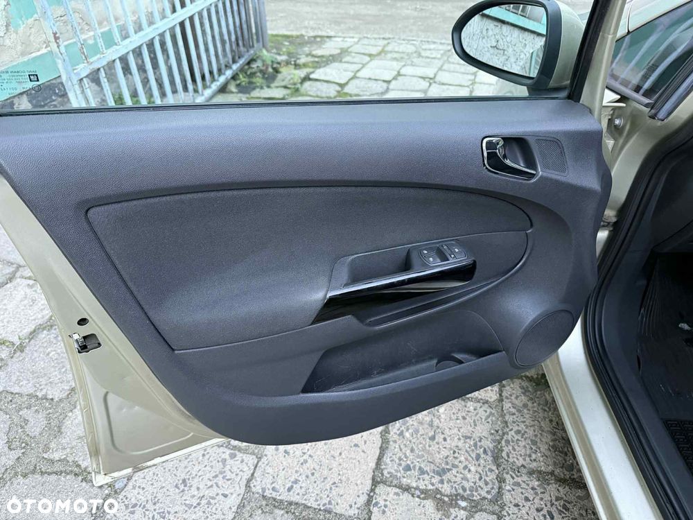 Opel Corsa 1.2 16V Enjoy - 11