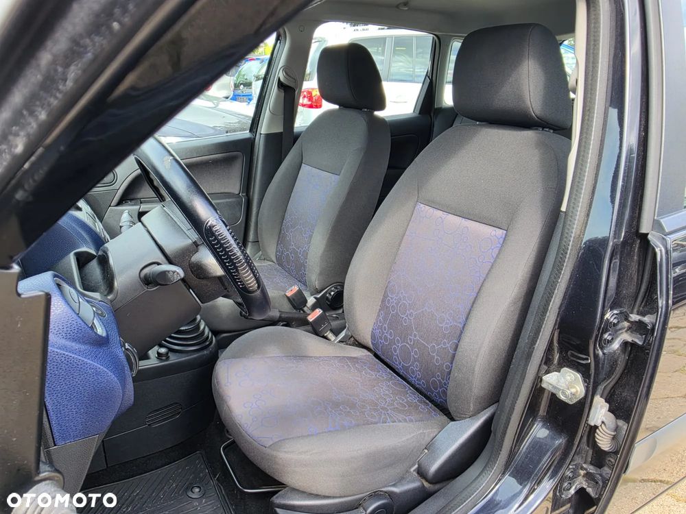 Ford Fiesta 1.4 Ghia - 13