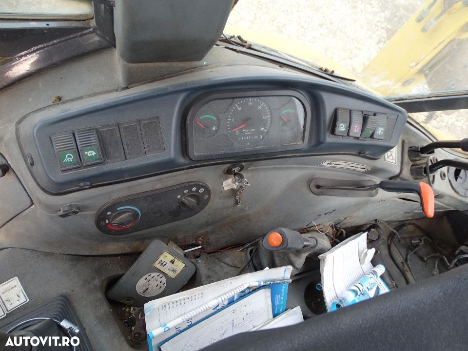 Dezmembrez buldoexcavator New Holland LB 110-115 , din  2007 - 6