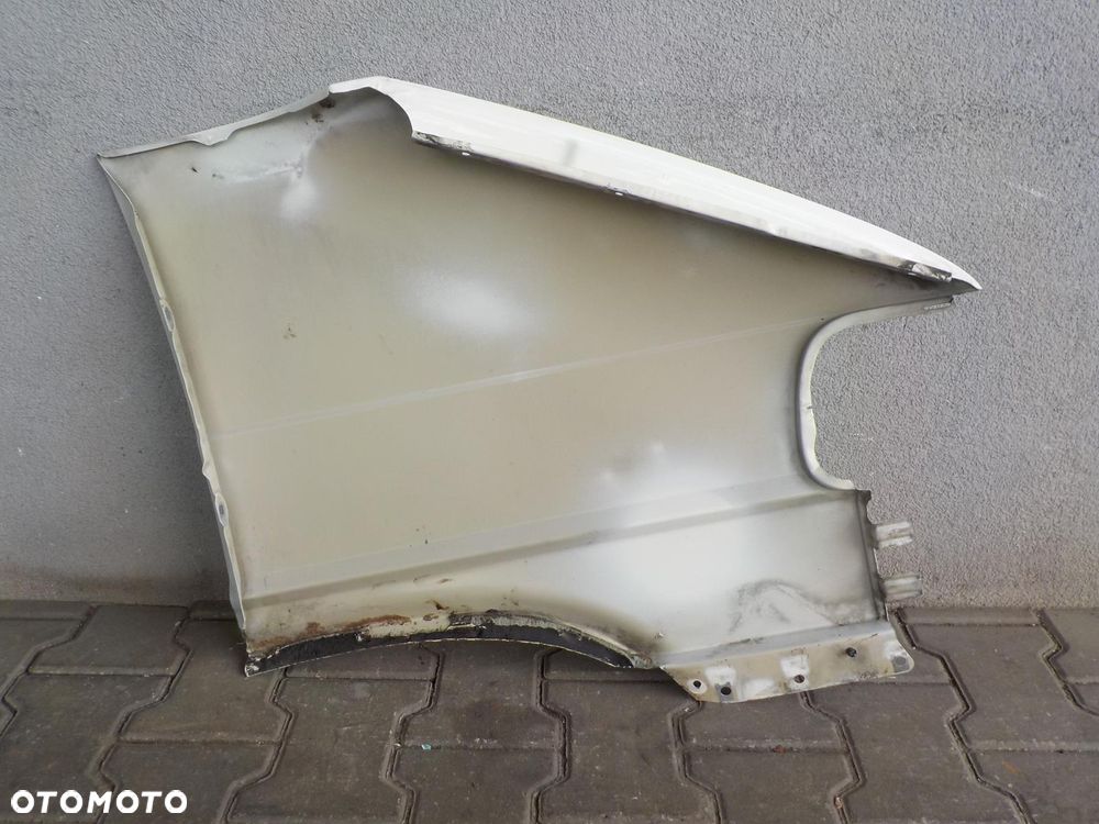 VW T4 CARAVELLE LIFT BŁOTNIK LEWY PRZÓD - 6
