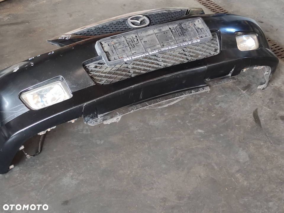 ZDERZAK + LAMPY MAZDA 323 BJ - 10