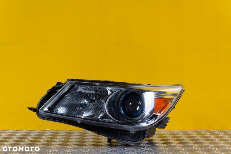 BUICK LACROSSE 2009- REFLEKTOR LAMPA XENON LEWA USA - 1