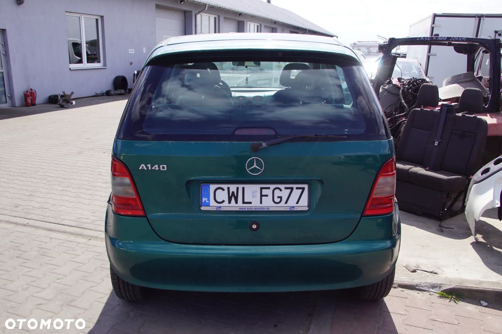 Auto na części - Mercedes A-Klasa W168 1.4 82 KM 166940 716501 282 1998R Silnik Skrzynia Drzwi Maska Błotnik Klapa Zderzak Lusterko Lampa Klamka Szyba Deska Kokpit Sterownik Moduł Czujnik Licznik Panel Kierownica - 5