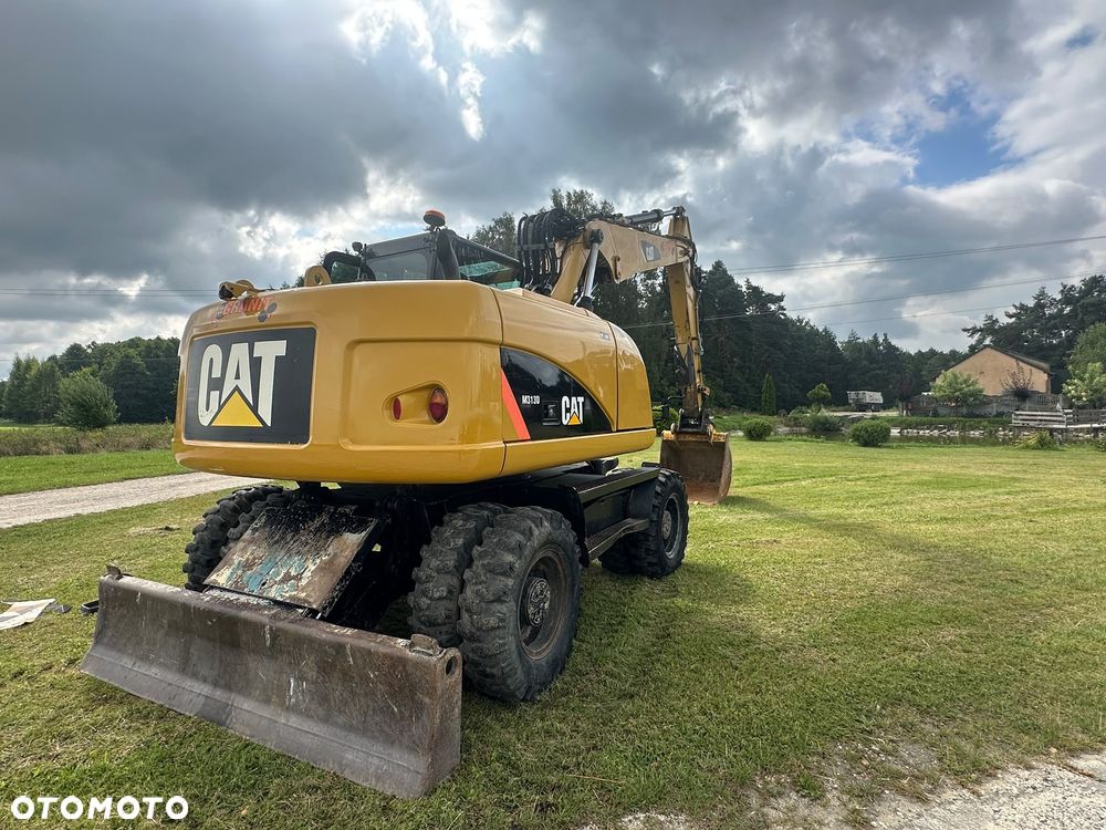 Caterpillar M313D - 3